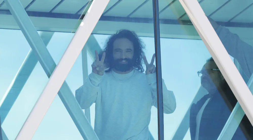 A migrant participating in the government's program Great Mission Return to the Homeland, waves upon arrival at Maiquetia International Airport, in Venezuela 16 January 2026. EPA