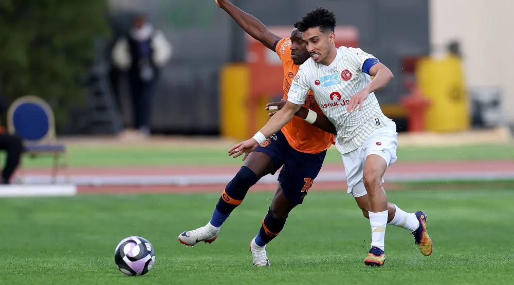 من المواجهة التي جمعت بين الفيحاء وضمك (تصوير: مشعل القدير)