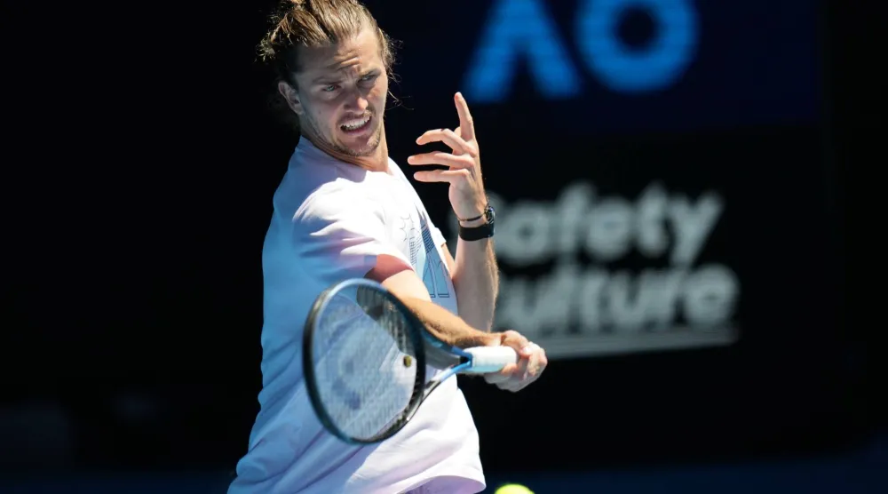 Alexander Zverev of Germany plays a forehand return during a practice session ahead of the Australian Open tennis championship in Melbourne, Australia, Saturday, Jan. 17, 2026. (AP Photo/Dita Alangkara)