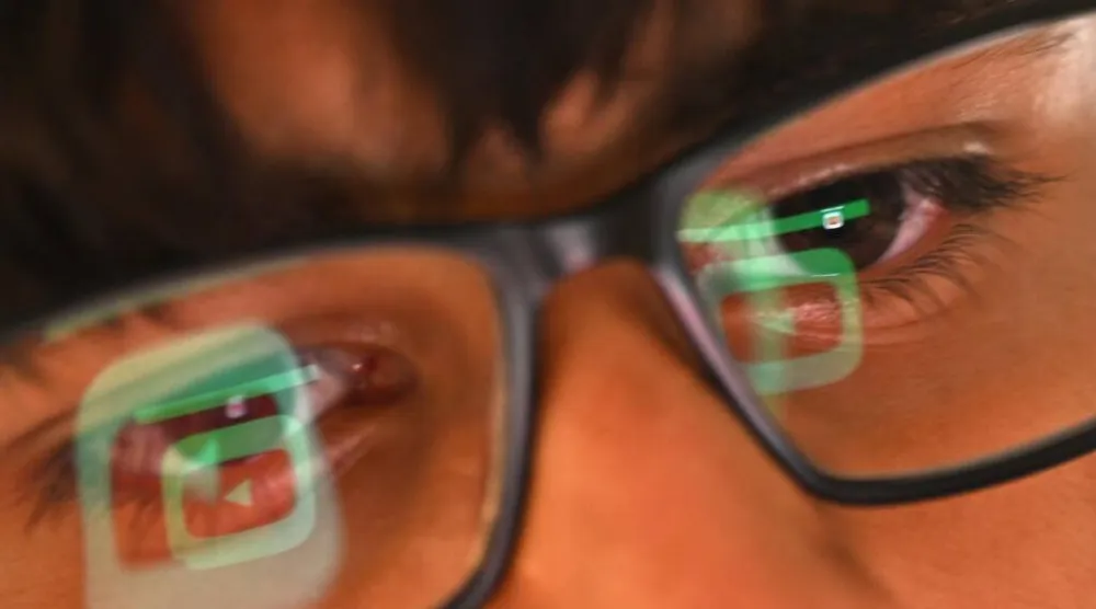 Some experts worry a blanket ban on social media could have unintended consequences. Saeed KHAN / AFP/File
