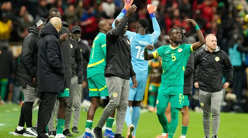  Senegal's Idrissa Gueye calls players to walk off the ptich during the Africa Cup of Nations final soccer match between Senegal and Morocco, in Rabat, Morocco, Sunday, Jan. 18, 2026. (AP) 