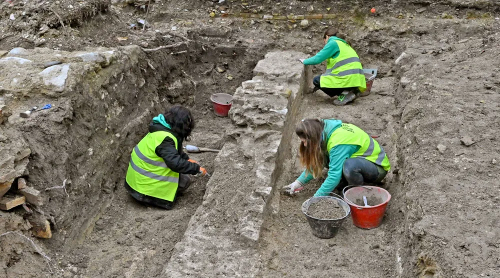 A handout photo made available by Regione Marche press office shows the excavations in Piazza Andrea Costa from which large columns emerge, remains believed of the Basilica of Vitruvius, in Fano, Italy, 19 January 2026. (EPA/Regione Marche press office)