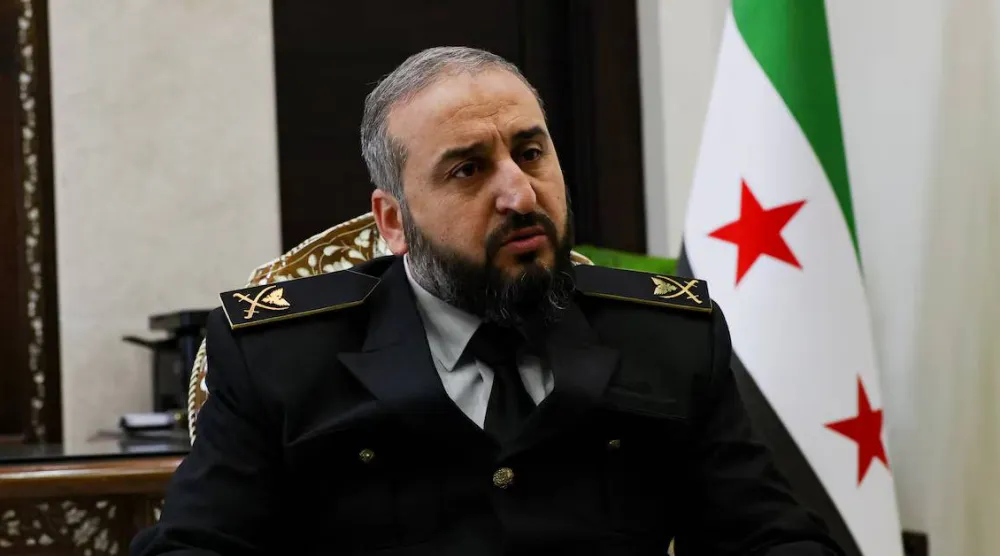 وزير الدفاع السوري مرهف أبو قصرة (رويترز)