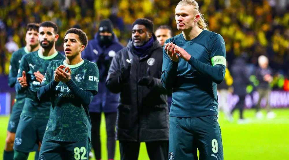  Soccer Football - UEFA Champions League - Bodo/Glimt v Manchester City - Aspmyra Stadion, Bodo, Norway - January 20, 2026 Manchester City's Erling Haaland and Rico Lewis applaud fans after the match Fredrik Varfjell/NTB via Reuters