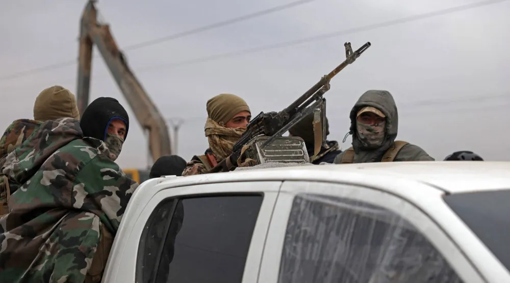 عناصر من الأمن السوري في الرقة (أ.ف.ب)