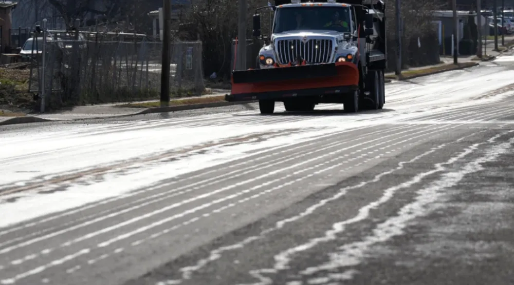 A Nashville Department of Transportation truck applies salt brine to a roadway Thursday, Jan. 22, 2026, in Nashville, Tenn. ahead of a winter storm expected to hit the state over the weekend. (AP Photo/George Walker IV)