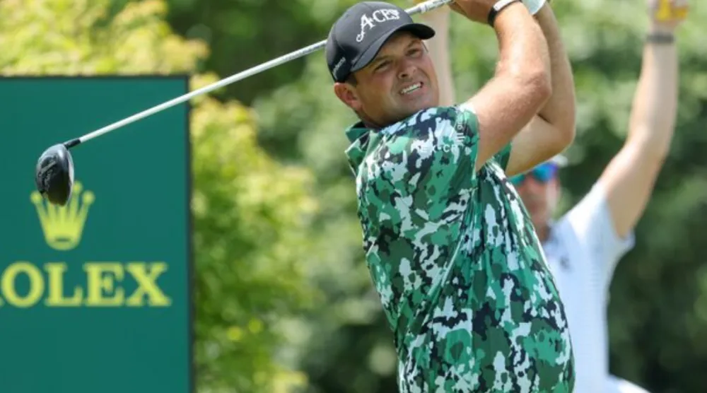 Jun 12, 2025; Oakmont, Pennsylvania, USA; Patrick Reed plays his shot from the first tee during the first round of the US Open golf tournament. Mandatory Credit: Charles LeClaire-Imagn Images 