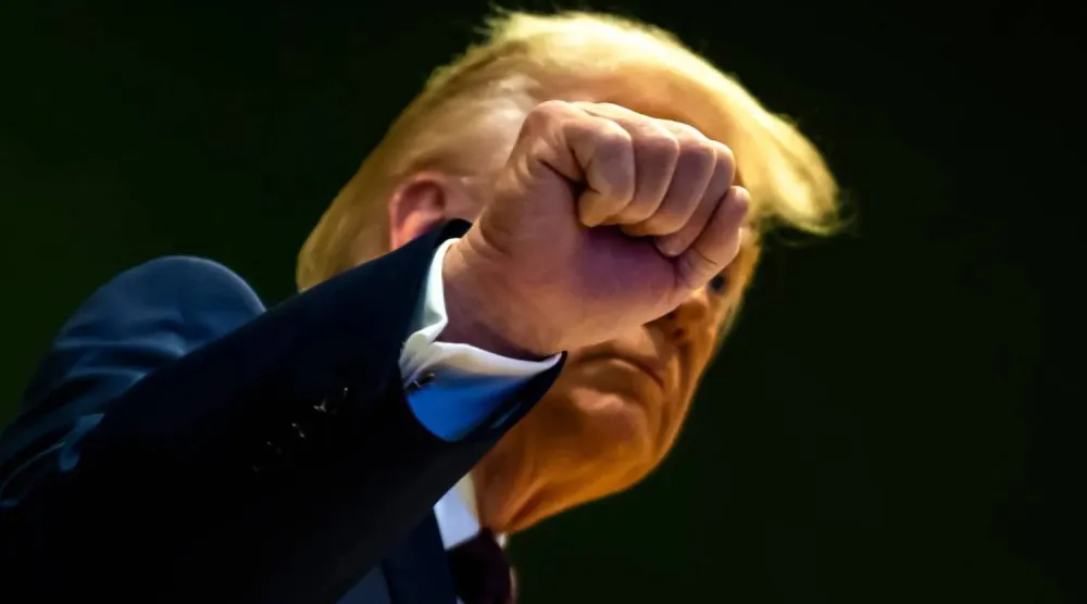 US President Donald Trump gestures after a signing ceremony for the Board of Peace in Davos, Switzerland (AP)