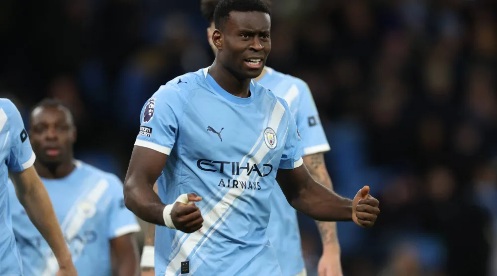 جيهي محتفلاً بالفوز على وولفرهامبتون (إ.ب.أ)