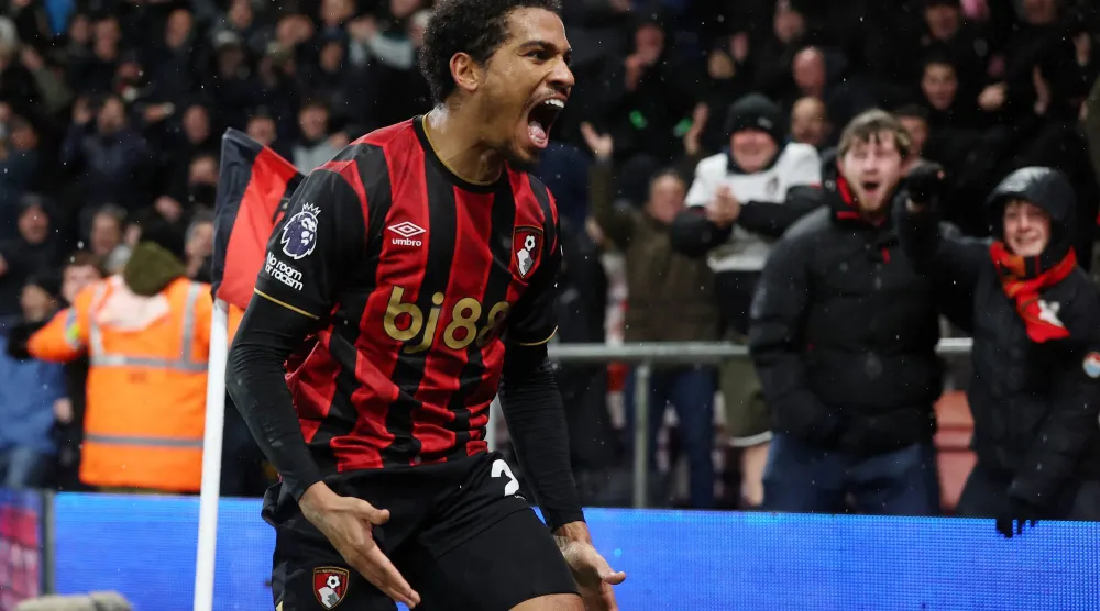 اللاعب المغربي أمين عدلي محتفلاً بالهدف الثمين (رويترز)