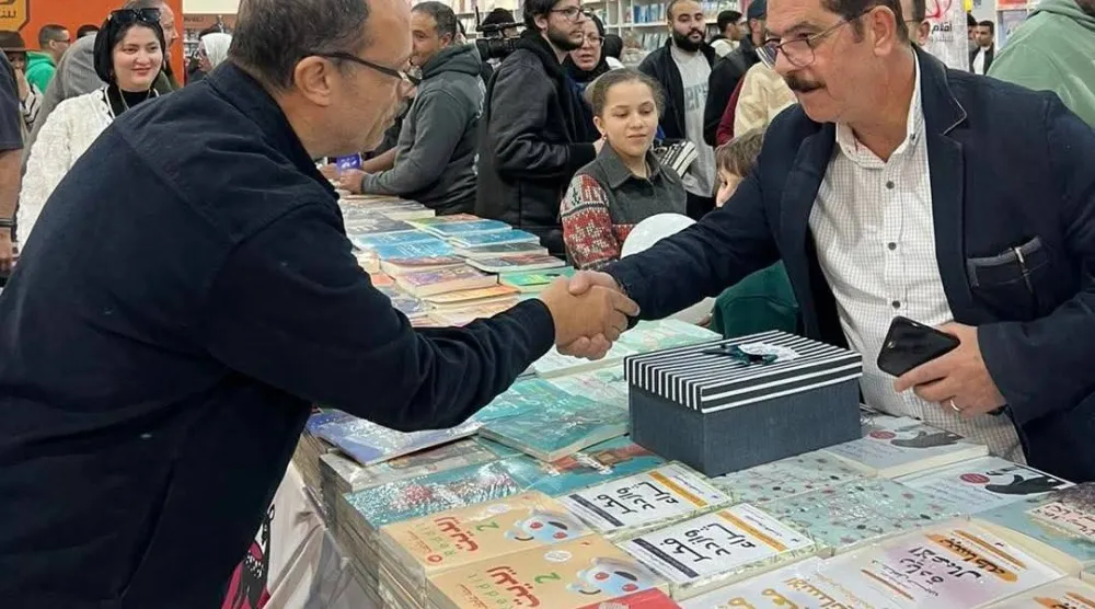 اللواء وليد السيسي في معرض القاهرة الدولي للكتاب (الشرق الأوسط)