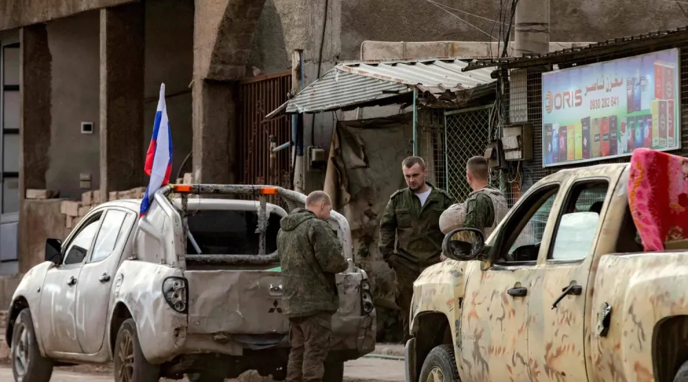 Rus güçleri, Suriye’nin doğusundaki Kamışlı kentindeki mevzilerini boşaltmaya hazırlanıyor – 12 Aralık 2024 (AFP)