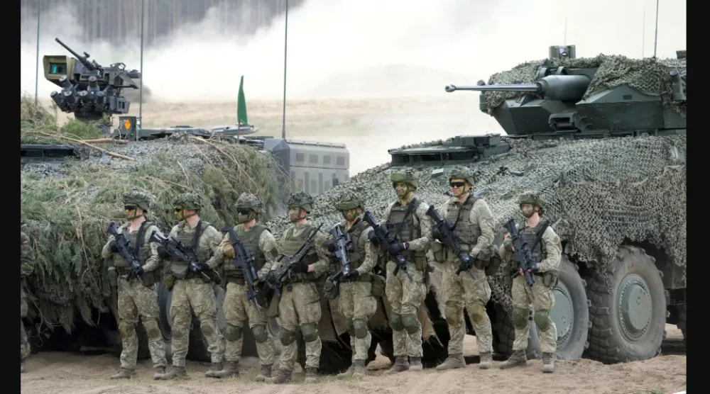 جنود ألمان يشاركون في مناورات عسكرية بليتوانيا عام 2024 (رويترز)