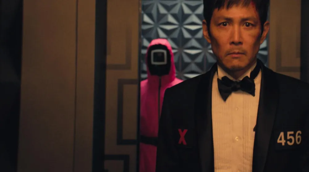 2021'de başlayan Squid Game, nakit sıkıntısı çeken bir grup insanın dudak uçuklatan bir para ödülü ve hayatta kalmak için verdikleri mücadeleyi anlatıyordu (Netflix)