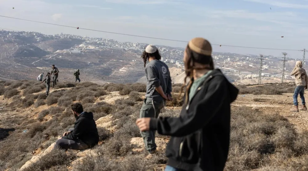 Yahudi yerleşimciler, Batı Şeria'daki Filistinlilerin mülklerine sık sık saldırı düzenliyor (AFP)