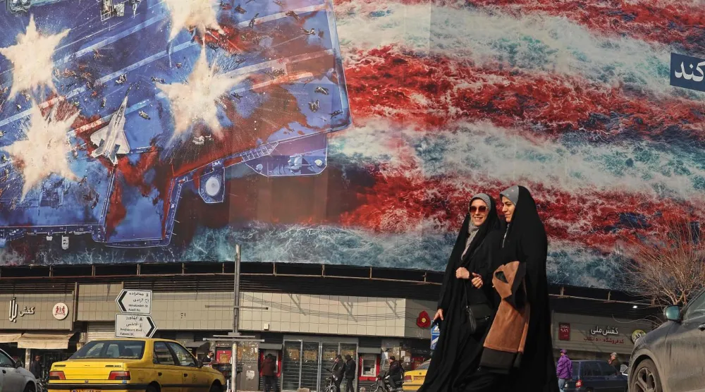 İran ekonomisi ABD ambargosunun da etkisiyle güçlük çekerken, Washington yönetimi askeri operasyon tehditlerini sürdürüyor (AFP)