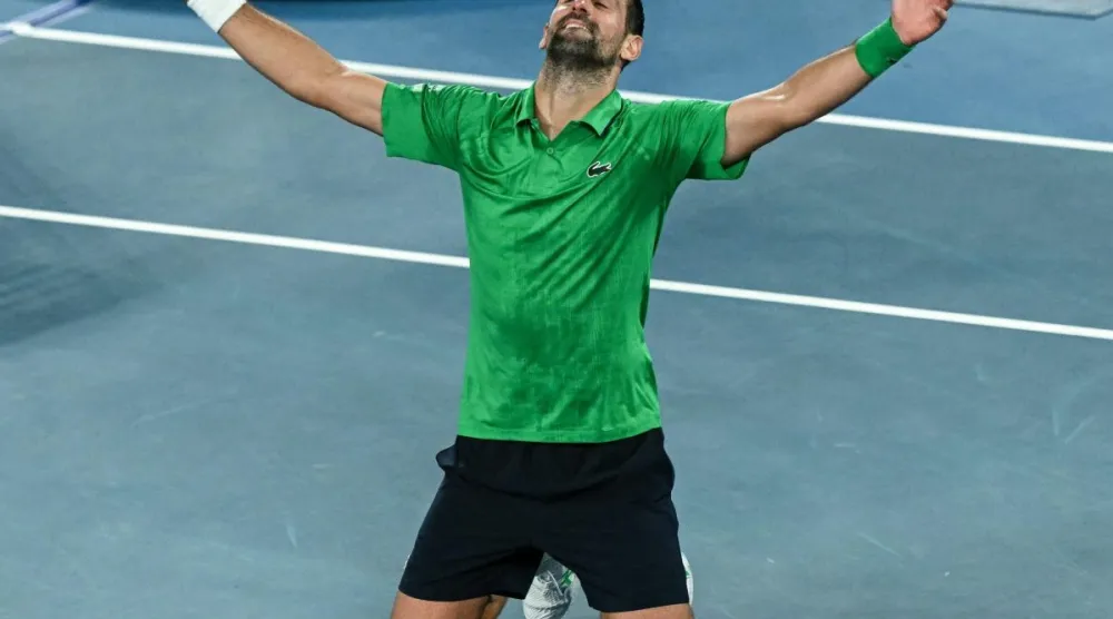 نوفاك محتفلاً بالفوز الكبير (أ.ف.ب)