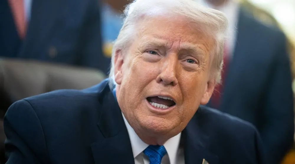 US President Donald Trump signs executive orders in the Oval Office at the White House, Washington, DC, USA, 30 January 2026. (EPA)