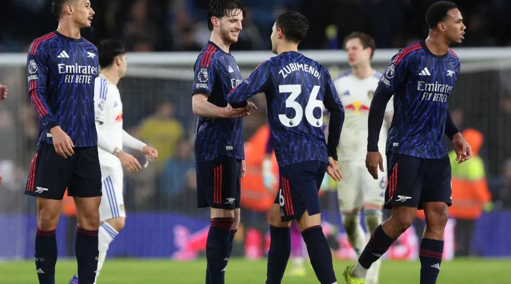 احتفالية لاعبي آرسنال تكررت أربع مرات أمام ليدز يونايتد (رويترز)