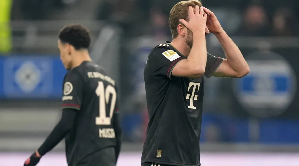 كين يتحسر بعد التعادل أمام هامبورغ (د.ب.أ)