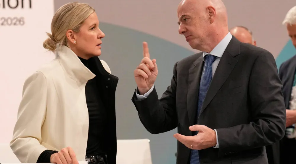 كريستي كوفنتري وجياني إنفانتينو يتحدثان عن مستقبل الرياضة (أ.ب)