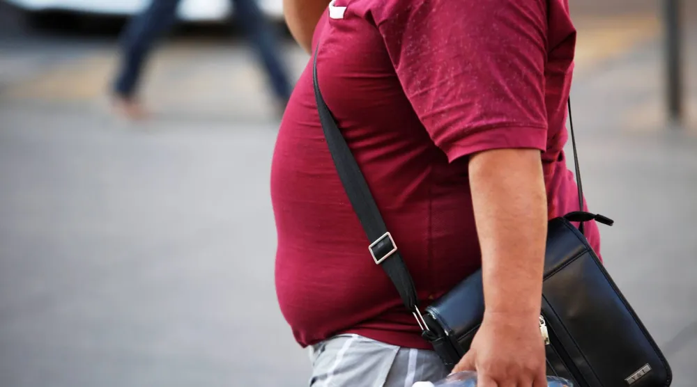 الوزن الزائد يمكن أن يفاقم مشاكل البروستاتا (رويترز)