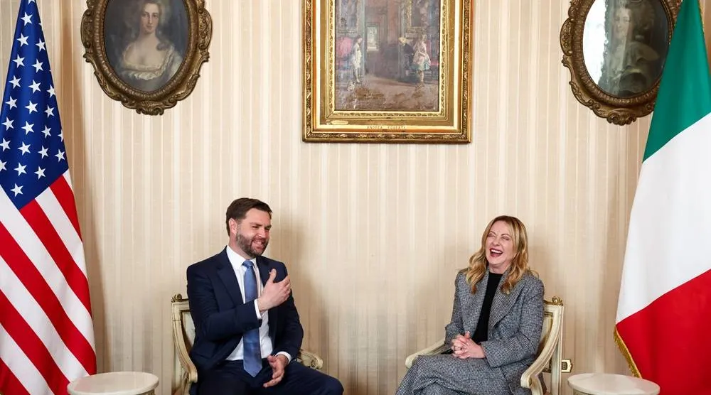  Italy's Prime Minister Giorgia Meloni, right, and US Vice President JD Vance hold a bilateral meeting during his visit to the 2026 Winter Olympics, in Milan, Italy, Friday, Feb. 6, 2026. (Kevin Lamarque/Pool Photo via AP) 