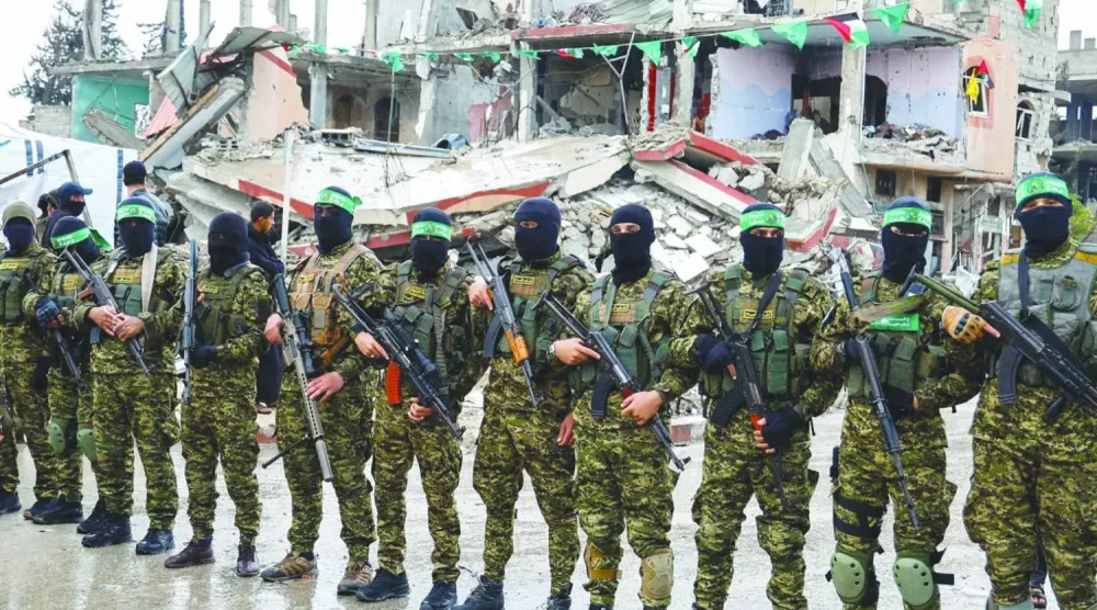  Gazze'nin güneyindeki Refah'ta, Hamas'ın silahlı kanadı olan İzzeddin el-Kassam Tugayları mensupları (Arşiv- Reuters)