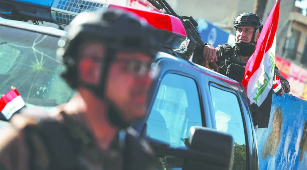 عناصر من الأمن العراقي في شوارع بغداد (د.ب.أ)