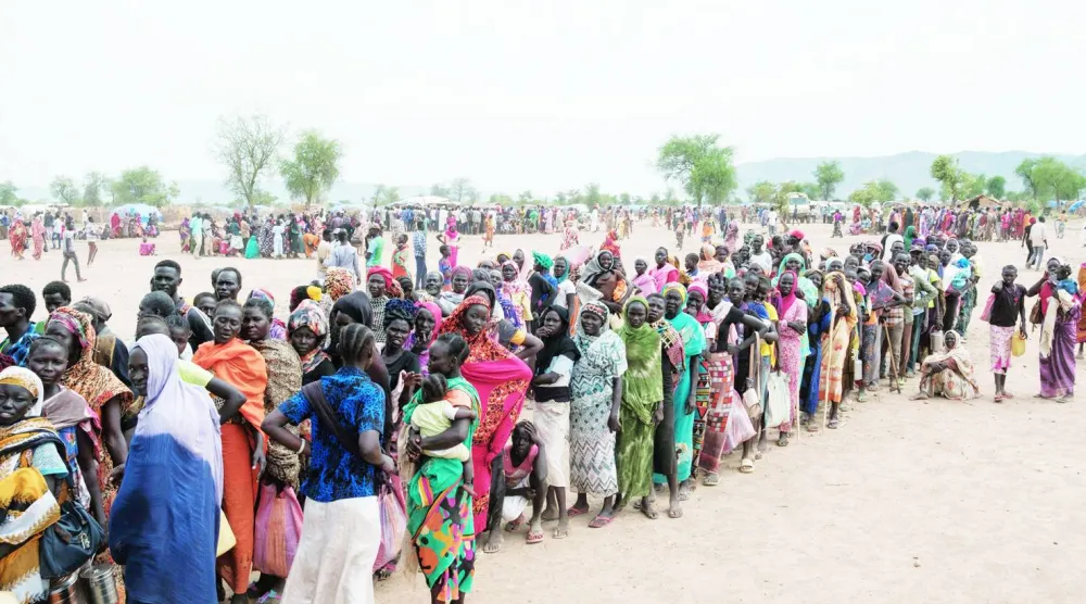 نازحون يصطفون للحصول على مساعدات غذائية في مخيم بشمال كردفان (أرشيفية - أ.ف.ب)