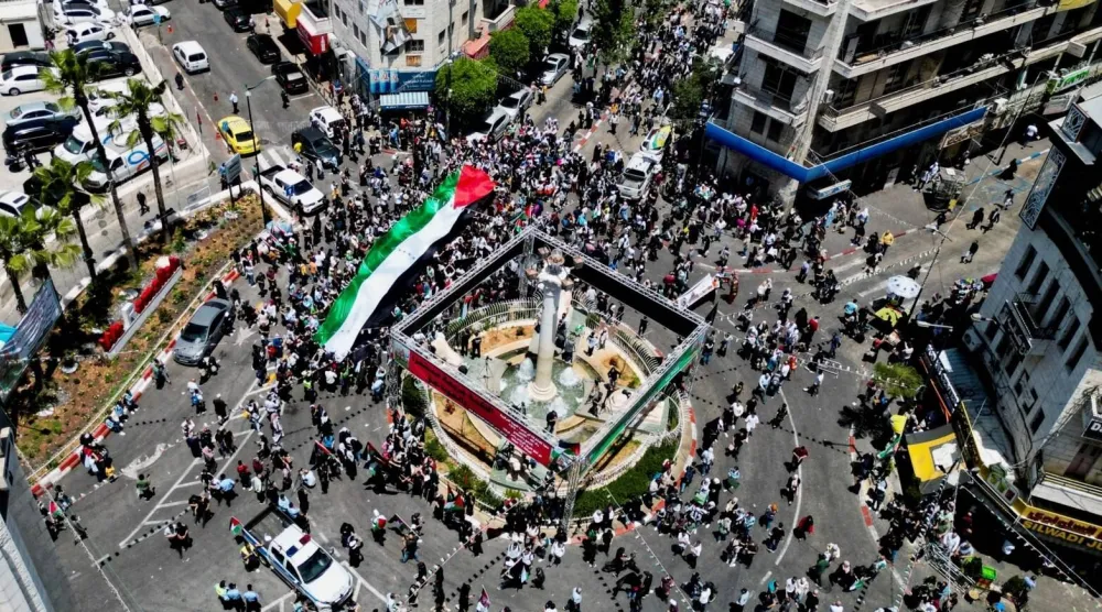 خلال مسيرة فلسطينية في رام الله بالضفة الغربية (رويترز - أرشيفية)