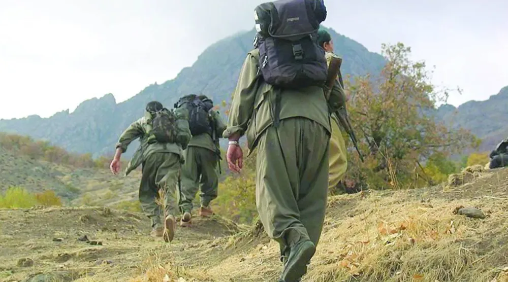 Irak'ın kuzeyindeki Kandil Dağları'nda bulunan PKK militanları (Reuters)