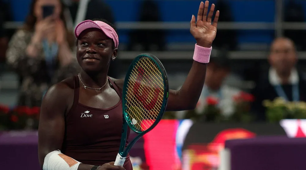 Canada's Victoria Mboko reacts after her women's singles quarter-final match against Kazakhstan's Elena Rybakina at the Qatar Open tennis tournament in Doha on February 12, 2026. (AFP)