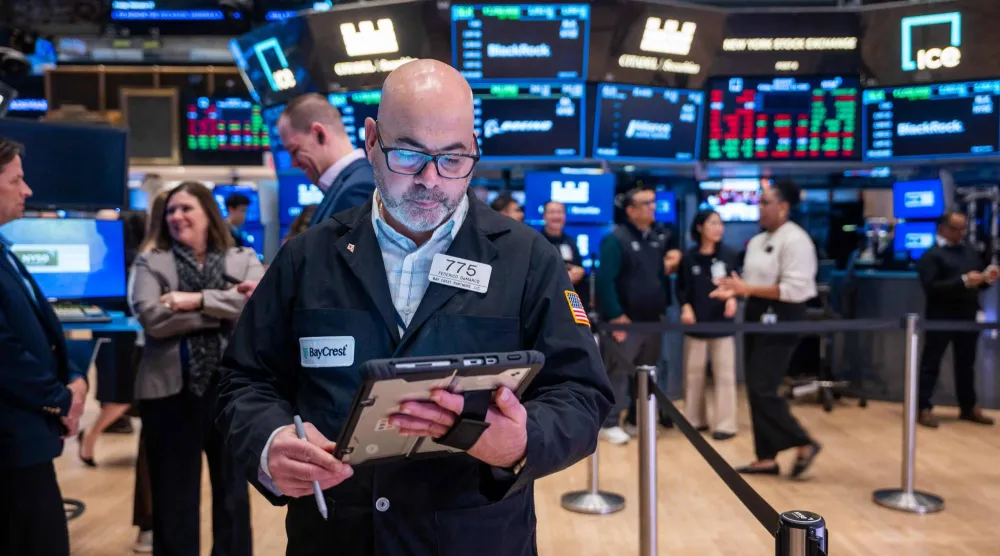 متداولون يعملون في بورصة نيويورك (أ.ف.ب)