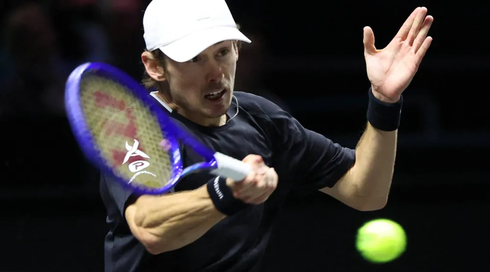 الأسترالي أليكس دي مينور (رويترز)