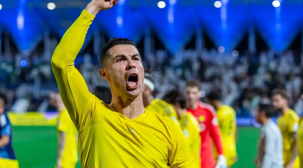 رونالدو محتفلا بالفوز على الفتح (تصوير: عيسى الدبيسي)