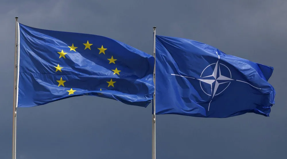 علَما الاتحاد الأوروبي وحلف «الناتو» في برلين (رويترز)