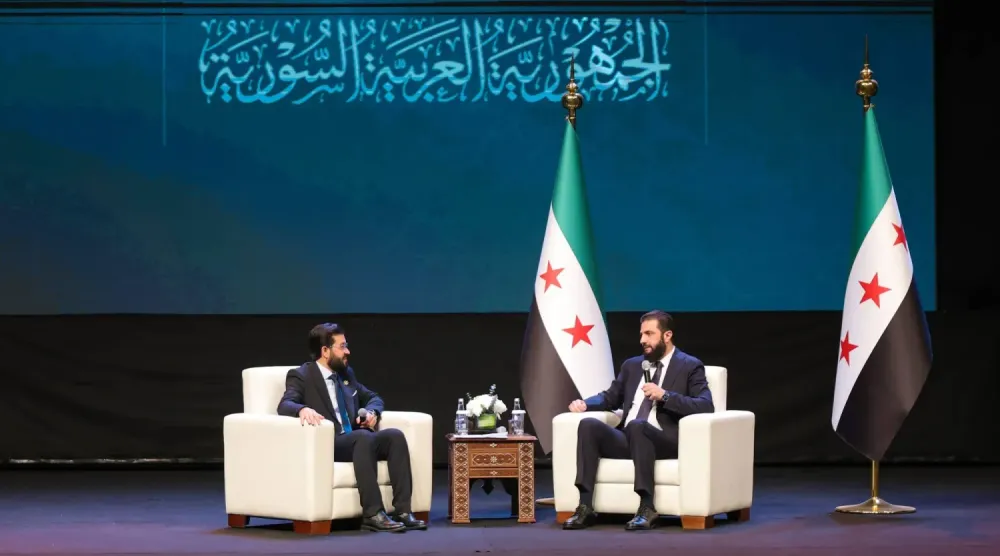 Suriye Cumhurbaşkanı, Şam'da düzenlenen "İslami Söylemin Birliği" konferansında (Cumhurbaşkanlığı hesabı)