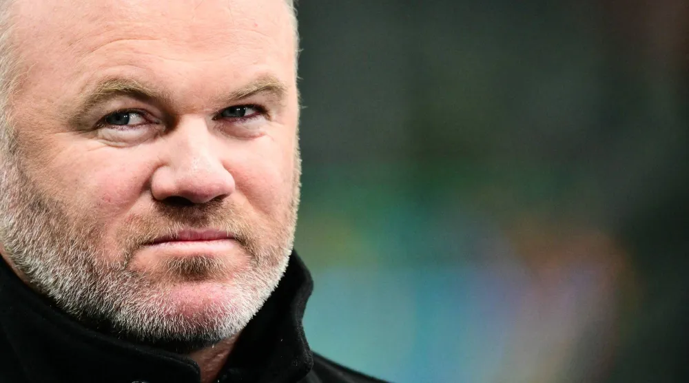 واين روني نجم الكرة الإنجليزية السابق (أ.ف.ب)