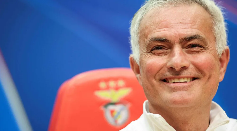 Benfica's coach Jose Mourinho reacts during a press conference on the eve of their UEFA Champions League knockout round play-off first leg football match against Real Madrid at Benfica Campus in Seixal, outskirts of Lisbon, on February 16, 2026. (AFP) 