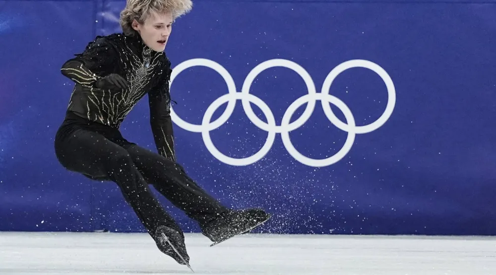 الأميركي إيليا مالينين حل ثامناً في التزلج الفني (أ.ب)