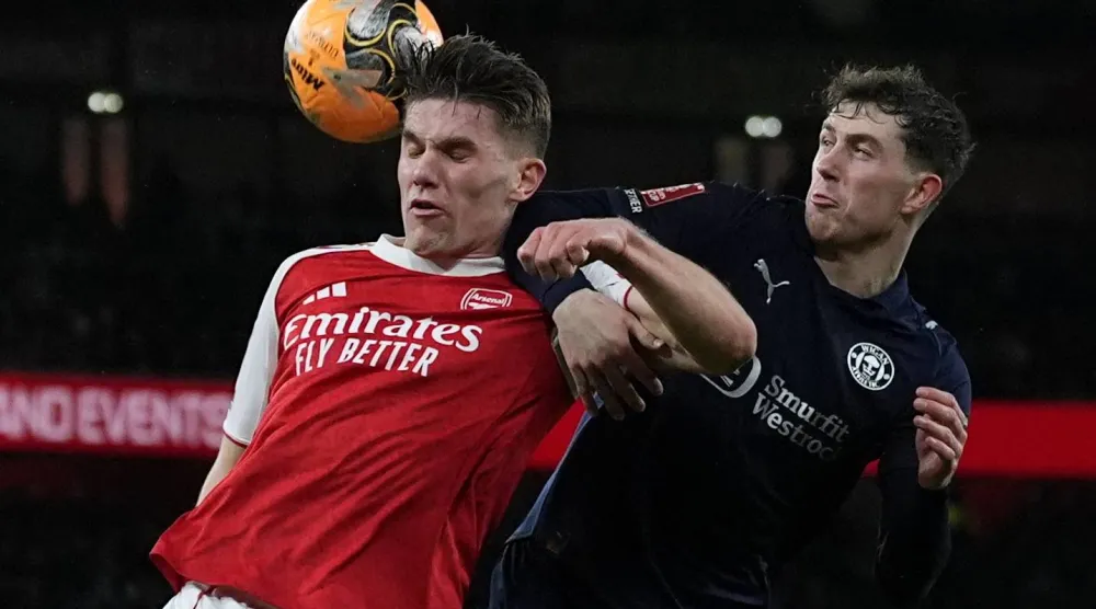 آرسنال هزم ويغان وسيلاقي مانسفيلد في كأس إنجلترا (أ.ب) 