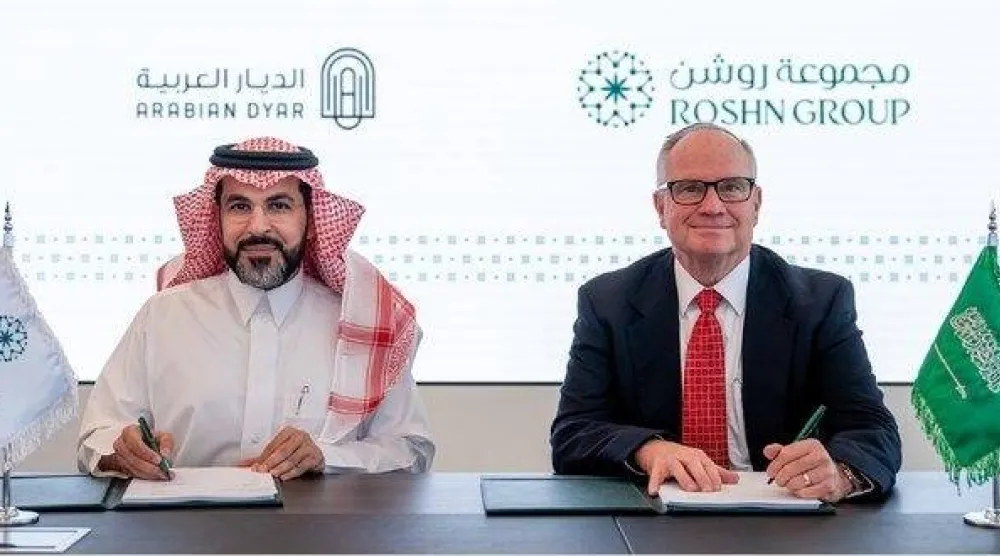 جانب من توقيع الاتفاقية (حساب روشن على منصة إكس)