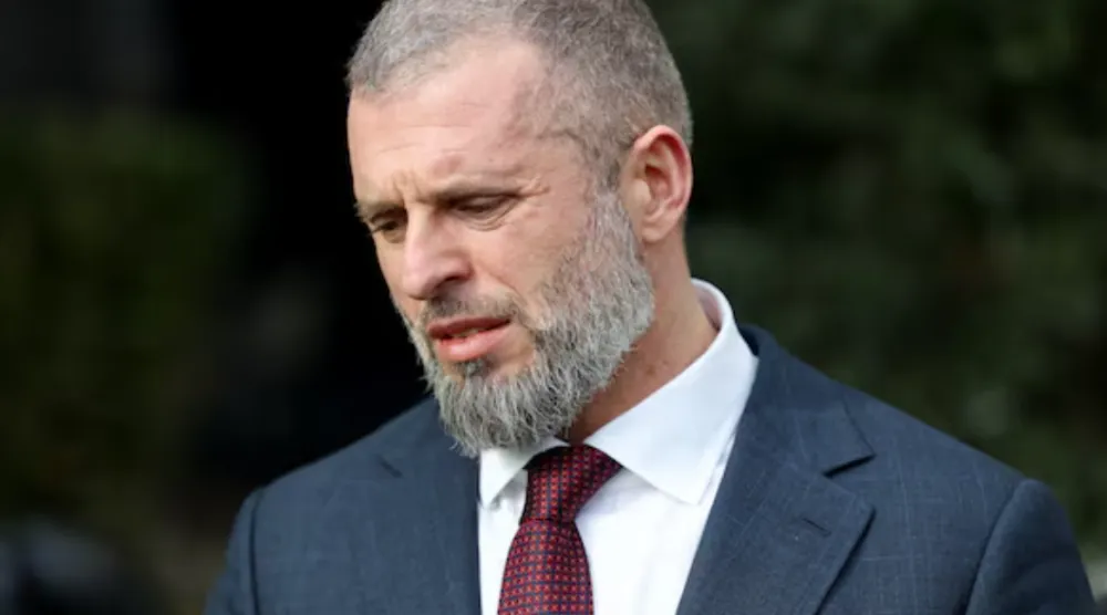 Milano Cortina 2026 Winter Olympics - Skeleton - Interview with Ukraine Youth and Sports minister Matvii Bidnyi - N H Hotel, Milan, Italy - February 12, 2026 Ukraine Youth and Sports Minister Matvii Bidnyi speaks after the disqualification of Ukrainian skeleton racer Vladyslav Heraskevych from the Winter Games. REUTERS/Kevin Coombs 