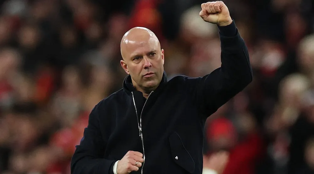 Soccer Football -  FA Cup - Fourth Round - Liverpool v Brighton & Hove Albion - Anfield, Liverpool, Britain - February 14, 2026 Liverpool manager Arne Slot celebrates after the match REUTERS/Phil Noble