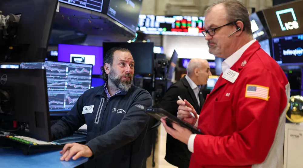 متداولون يعملون في بورصة نيويورك (أ.ف.ب)