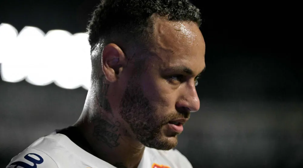 Santos' forward Neymar #10 looks on during the Campeonato Paulista football match between Santos and Botafogo de Ribeirao Preto at the Urbano Caldeira Stadium in Santos, Sao Paulo state, Brazil on February 5, 2025. (AFP) 