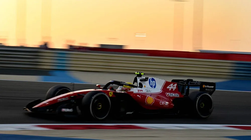 Ferrari's British driver Lewis Hamilton drives on the second day of the Formula One pre-season testing at the Bahrain International Circuit in Sakhir on February 19, 2026. (AFP)