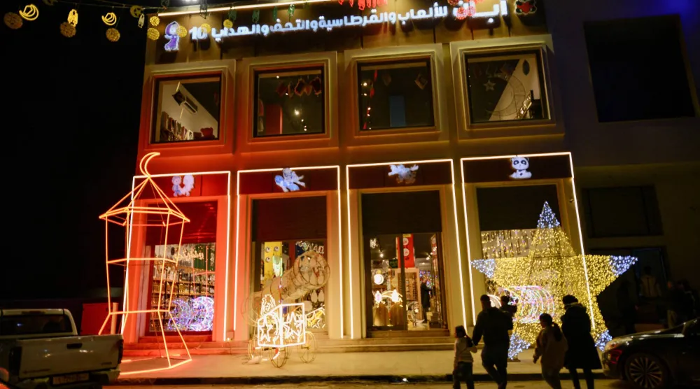 A family walks on their way to shop for Ramadan decorations ahead of the holy month of Ramadan in Benghazi, Libya, February 16, 2026. (Reuters)