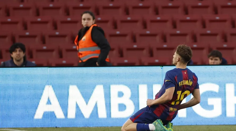 FC Barcelona midfielder Fermin Lopez celebrates after scoring the 3-0 goal during the Spanish LaLiga soccer match between FC Barcelona and Levante UD in Barcelona, Spain, 22 February 2026.  EPA/ALBERTO ESTEVEZ